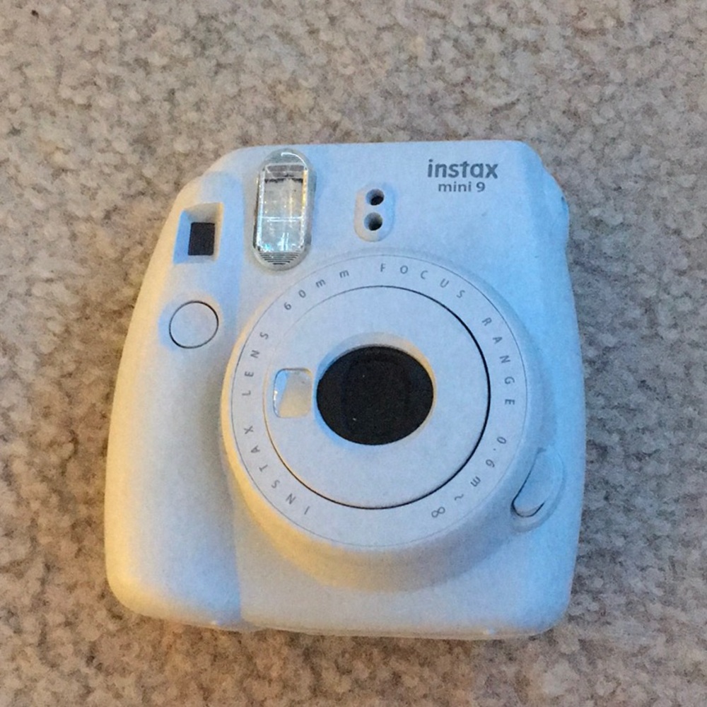 Light gray Polaroid no film included :)